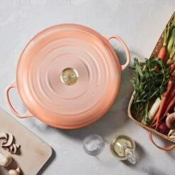 Le Creuset Signature Cast Iron 5-quart Peche Braiser 10 Le Creuset Signature Cast Iron 5-quart Peche Braiser -Zwilling Shop 2 6176f5e6 e63c 4464 a241 0ada99fed407