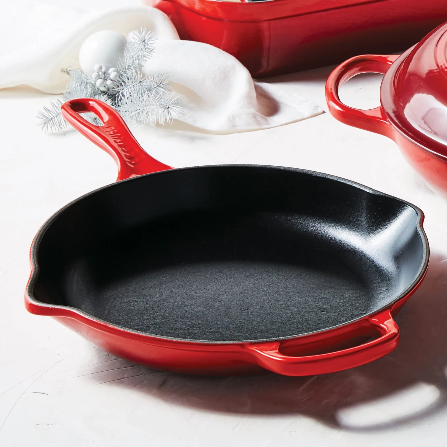 Le Creuset Signature Cast Iron 10.25" Cerise Skillet 4 Le Creuset Signature Cast Iron 10.25" Cerise Skillet - Image 2