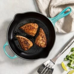 Le Creuset Signature Cast Iron 11.75" Caribbean Skillet 15 Le Creuset Signature Cast Iron 11.75" Caribbean Skillet -Zwilling Shop 38203