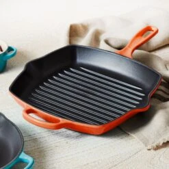 Le Creuset Signature Cast Iron 10.25" Flame Square Grill Pan 15 Le Creuset Signature Cast Iron 10.25" Flame Square Grill Pan -Zwilling Shop 38384 c4c0a463 098d 4269 81e4 f0b3c8a03580