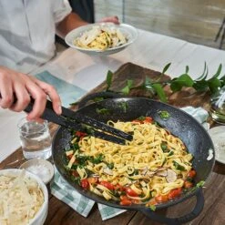 Staub 14" Matte Black Wok With Glass Lid -Zwilling Shop 40509 336 0 Product In Use OS 750x750 3