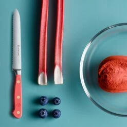 Wusthof Classic 5" Coral Peach Serrated Utility Knife 13 Wusthof Classic 5" Coral Peach Serrated Utility Knife -Zwilling Shop 52754