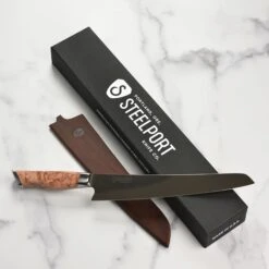 Steelport Carbon Steel 10" Slicing Knife With Oregon Maple Magnetic Sheath 23 Steelport Carbon Steel 10" Slicing Knife With Oregon Maple Magnetic Sheath -Zwilling Shop 55102