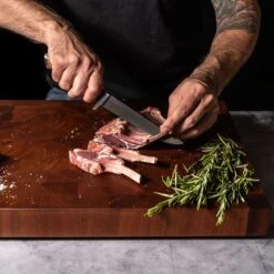 Steelport Carbon Steel 6" Boning Knife -Zwilling Shop Boning knife in use 2