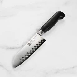 Zwilling Four Star 5.5" Hollow Edge Santoku Knife
