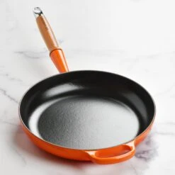 Le Creuset Cast Iron 10.25" Flame Fry Pan With Wood Handle 15 Le Creuset Cast Iron 10.25" Flame Fry Pan With Wood Handle -Zwilling Shop DSC 2667