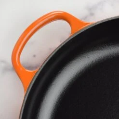 Le Creuset Cast Iron 10.25" Flame Fry Pan With Wood Handle 12 Le Creuset Cast Iron 10.25" Flame Fry Pan With Wood Handle -Zwilling Shop DSC 2668