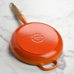 Le Creuset Cast Iron 10.25" Flame Fry Pan With Wood Handle 11 Le Creuset Cast Iron 10.25" Flame Fry Pan With Wood Handle -Zwilling Shop DSC 2670