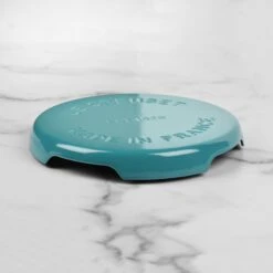 Le Creuset Signature Cast Iron 8.8" Caribbean Round Trivet 11 Le Creuset Signature Cast Iron 8.8" Caribbean Round Trivet -Zwilling Shop DSC 5995 2