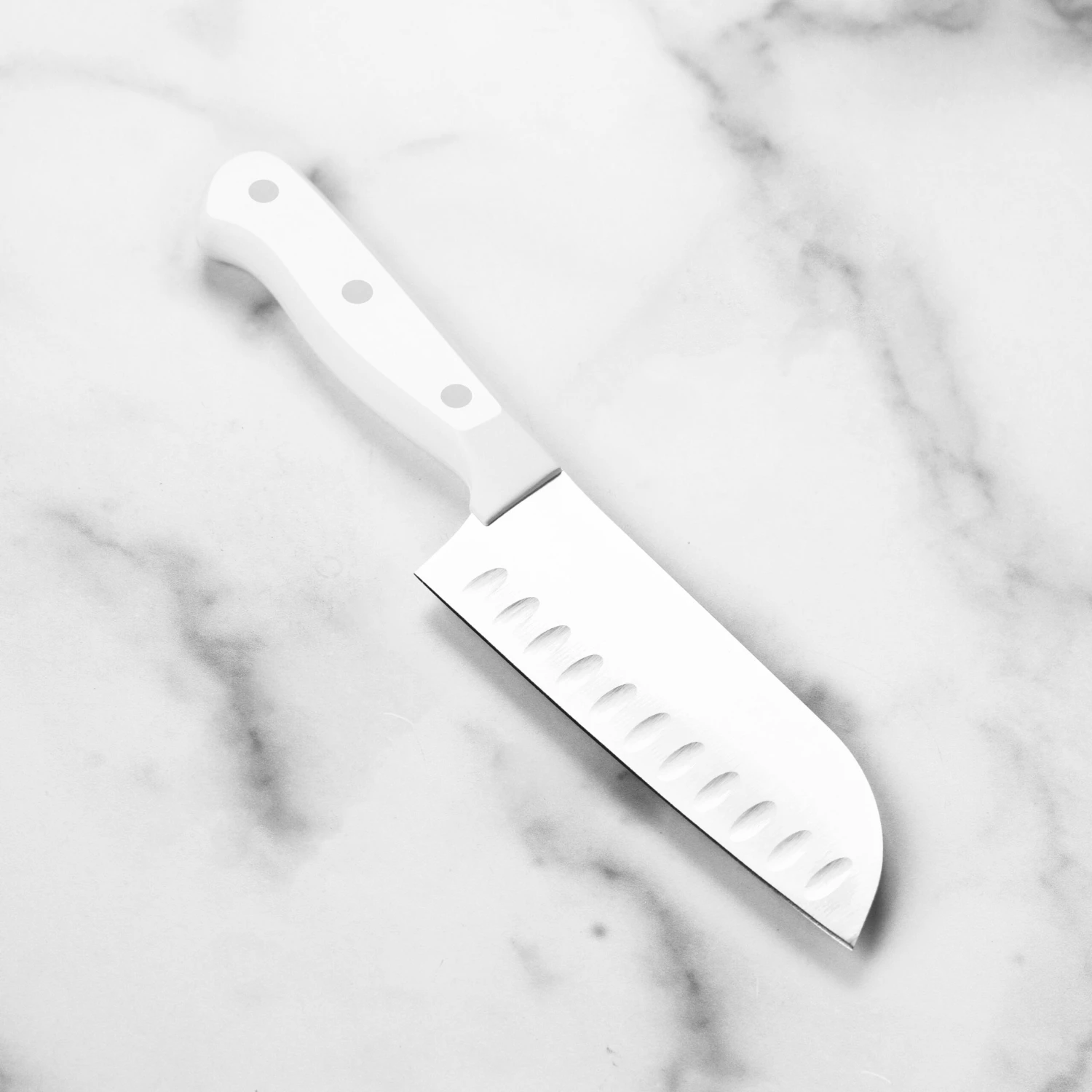 Wusthof Gourmet 5" Hollow Edge Santoku Knife, White Handle 7 Wusthof Gourmet 5" Hollow Edge Santoku Knife, White Handle - Image 5