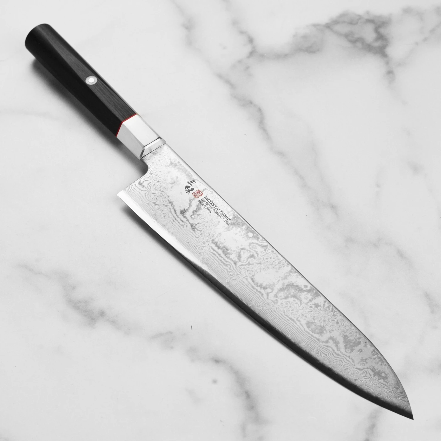 Zanmai Hybrid Damascus Splash 9.4" Gyuto 3 Zanmai Hybrid Damascus Splash 9.4" Gyuto