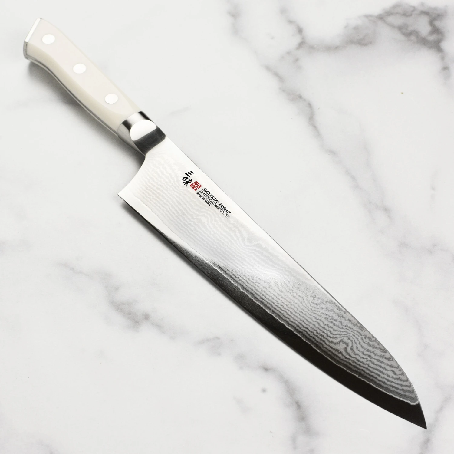 Zanmai Classic Damascus Corian 9.4" Gyuto 3 Zanmai Classic Damascus Corian 9.4" Gyuto