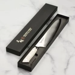 Zanmai Classic Damascus Corian 9.4" Gyuto 14 Zanmai Classic Damascus Corian 9.4" Gyuto -Zwilling Shop DSC 6692