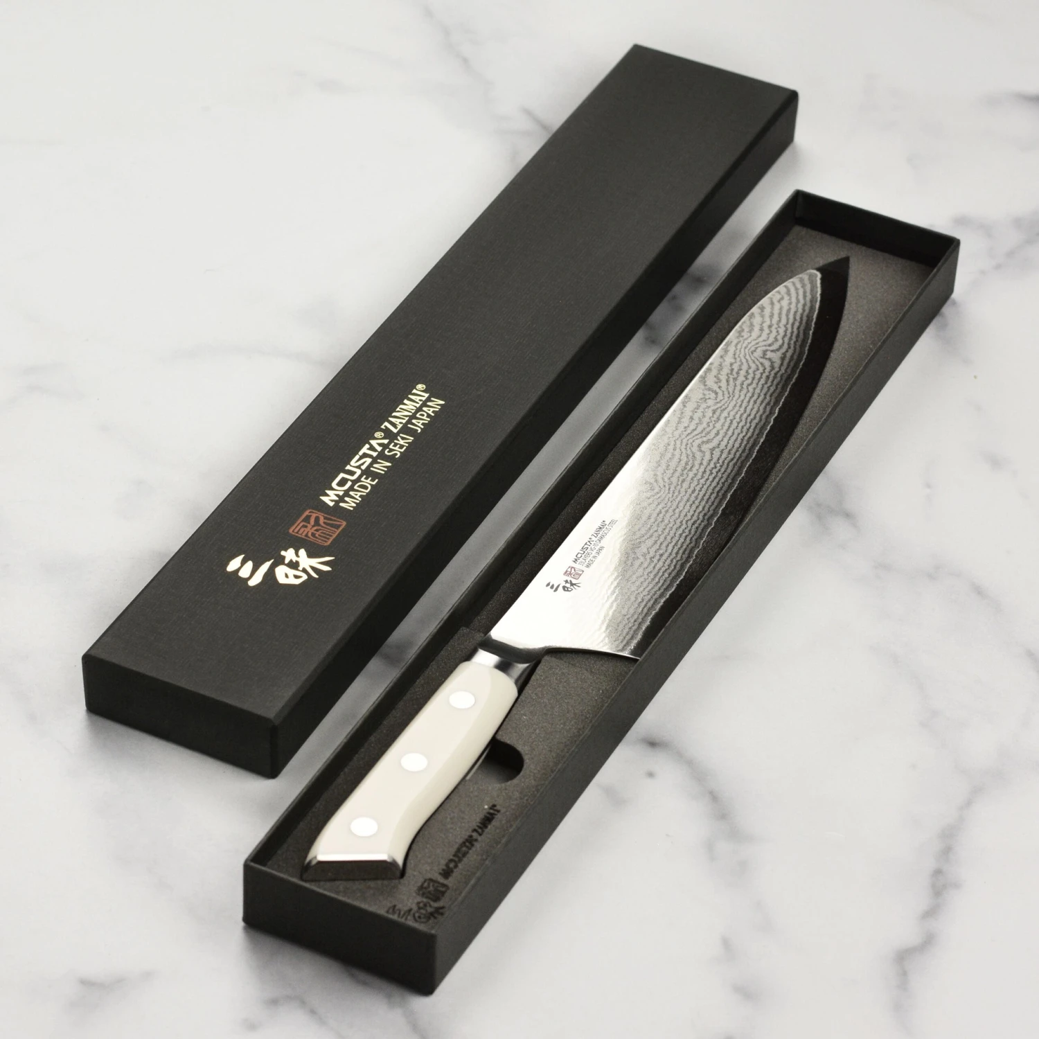 Zanmai Classic Damascus Corian 9.4" Gyuto 8 Zanmai Classic Damascus Corian 9.4" Gyuto - Image 6