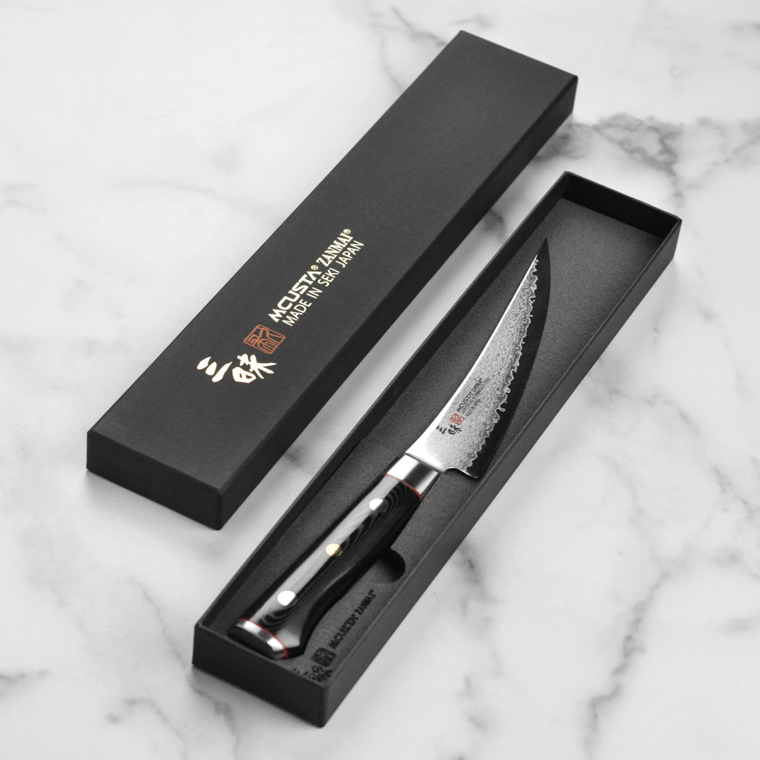 Zanmai Classic Pro Zebra Damascus 6.5" Curved Boning Knife 8 Zanmai Classic Pro Zebra Damascus 6.5" Curved Boning Knife - Image 6