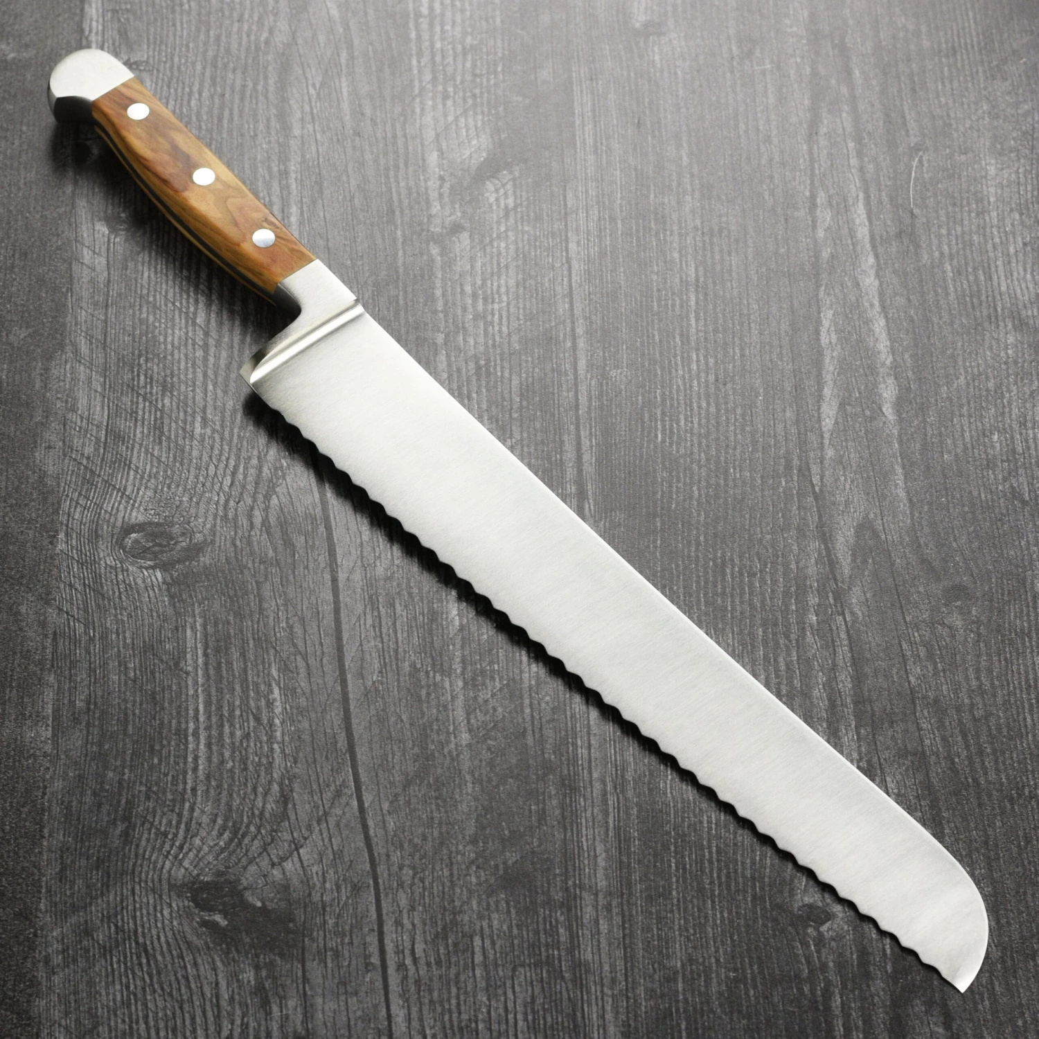 Franz Gude 12.6" Large Bread Knife With Olive Wood Handle, Left-Handed 9 Franz Gude 12.6" Large Bread Knife With Olive Wood Handle, Left-Handed - Image 7