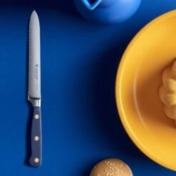 Wusthof Classic 5" Wild Blueberry Serrated Utility Knife 11 Wusthof Classic 5" Wild Blueberry Serrated Utility Knife -Zwilling Shop clc wb mood top 06 pt 3to4 Copy